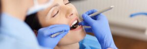 Dentist examining relaxed and sedated patient
