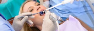 Woman getting a root canal at dentist's office